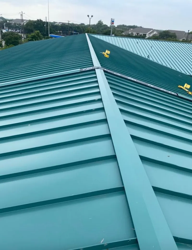 Green commercial metal roof ridge and valley for Metal Roof Repair in Hoover